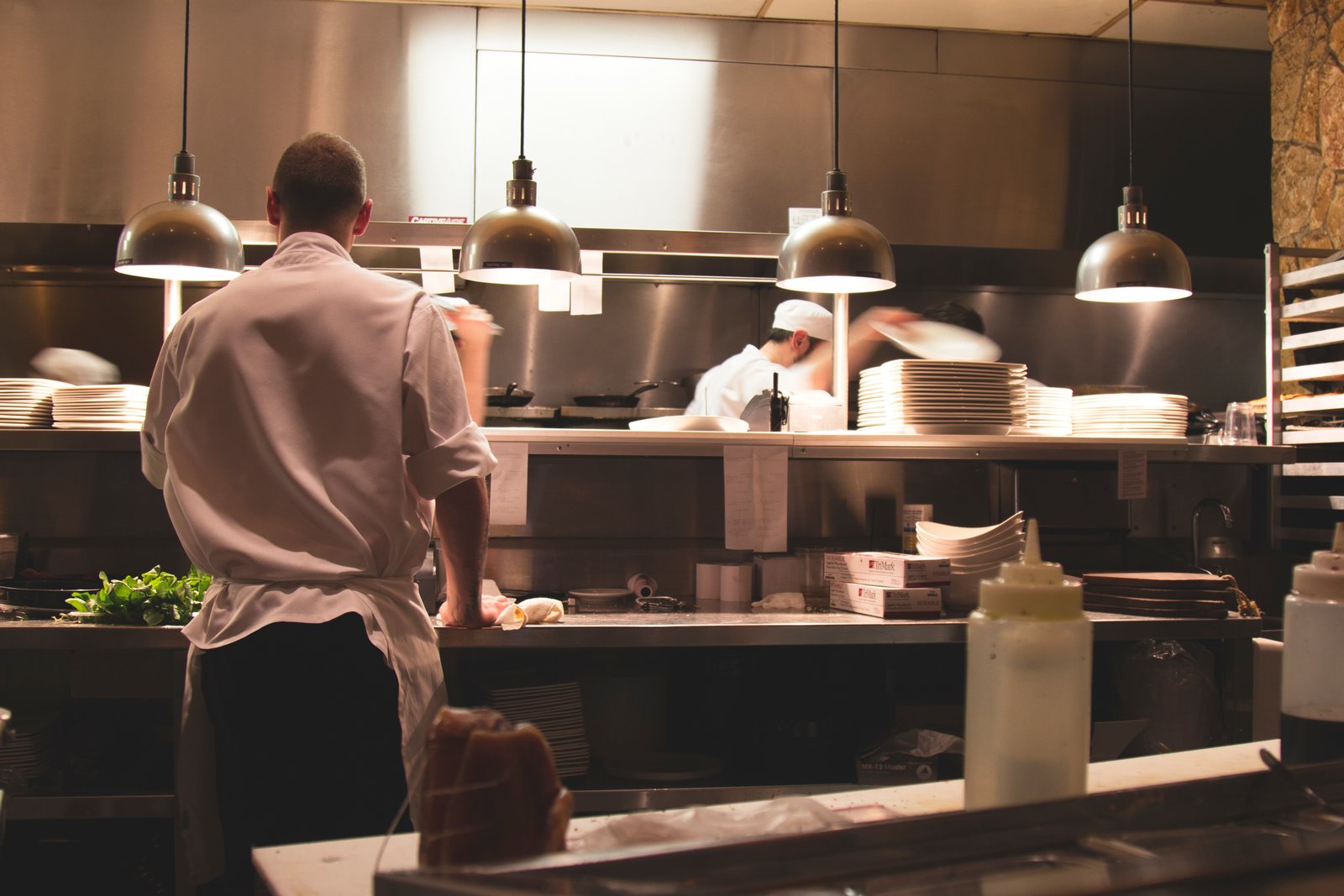 Cooks working the line in a restaurant kitchen